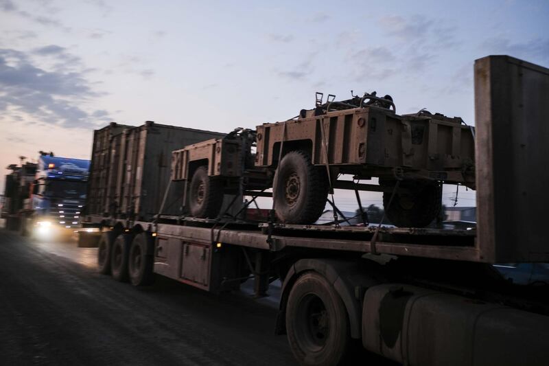 A convoy of U.S. armored military vehicles leave Syria on a road to Iraq. Getty Images