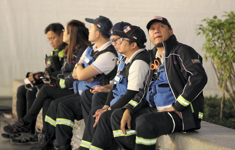 DUBAI , UNITED ARAB EMIRATES – Dec 31 , 2019 : Paramedic staff outside the Dubai Mall for the NYE 2020 fireworks at Dubai Mall in Dubai. ( Pawan Singh / The National ) For News/Online/Instagram