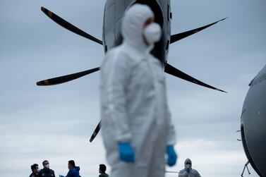 A Turkish military cargo plane with medical supplies and protective equipment to combat COVID-19 in the US is unloaded at Andrews Air Force Base April 28, 2020, in Maryland. AFP 