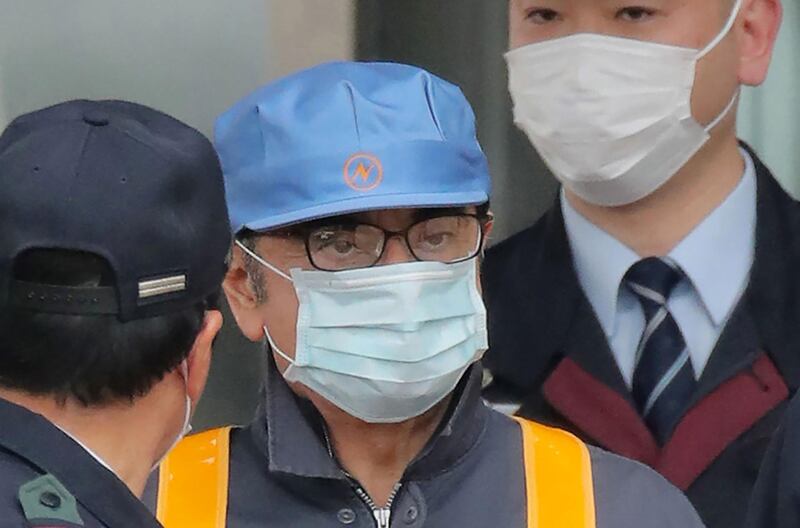 Former Nissan chairman Carlos Ghosn leaves the Tokyo Detention House following his release on bail in Tokyo on March 6, 2019.  Ghosn posted bail of 1 billion yen (9 million USD) in cash on March 6, paving the way for his release from the Tokyo detention centre after more than three months in custody. - Japan OUT
 / AFP / JIJI PRESS / JIJI PRESS
