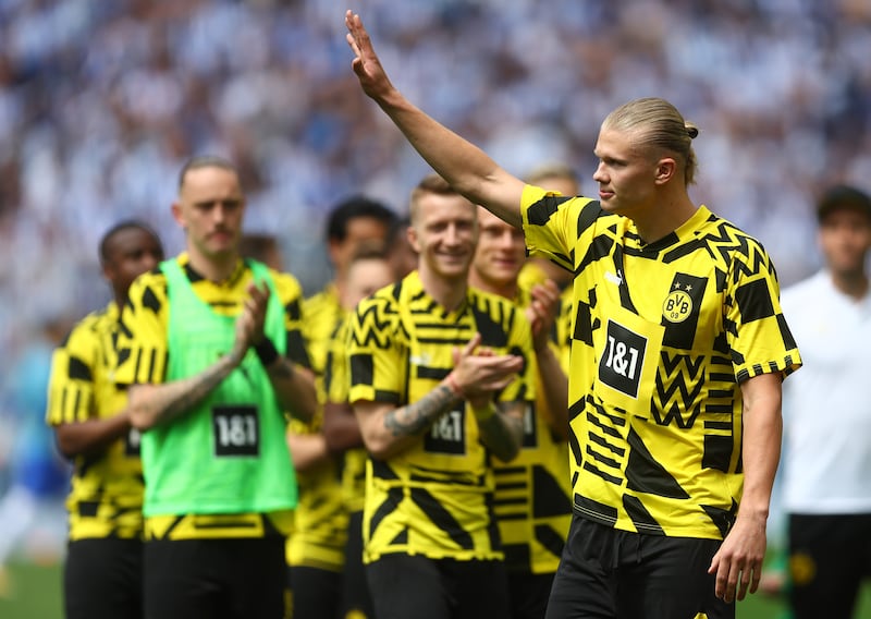 Erling Haaland of Dortmund acknowledges fans prior to his last Bundesliga match against Hertha at Signal Iduna Park on May 14, 2022. Getty