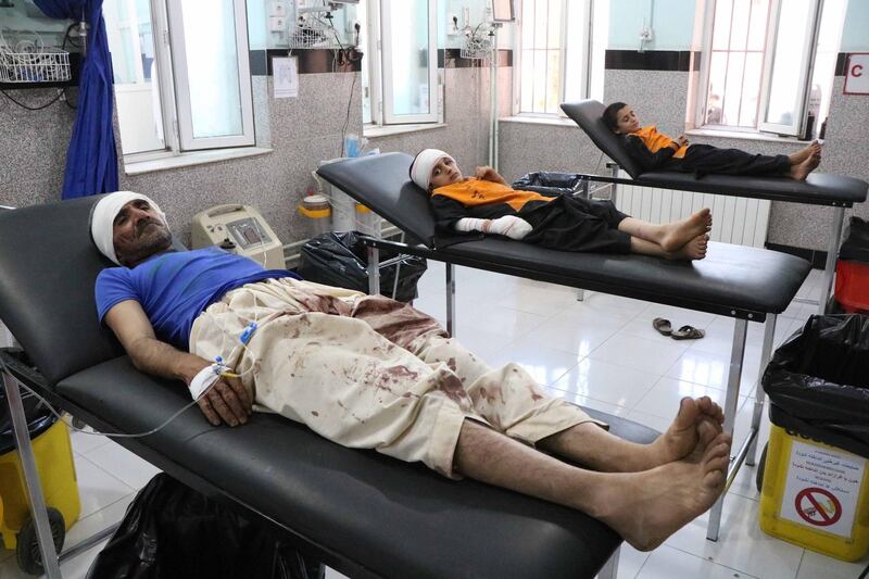 Afghans who were injured in an alleged airstrike by Afghan security forces on suspected Taliban hideouts in Gozara district, receive medical treatment after they were brought to a hospital in Herat, Afghanistan.  EPA