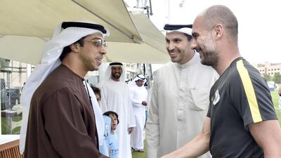 Sheikh Mansour bin Zayed, Deputy Prime Minister and Minister of Presidential Affairs and owner of Manchester City Football Club, meets Pep Guardiola in Abu Dhabi, with Khaldoon Al Mubarak. Wam