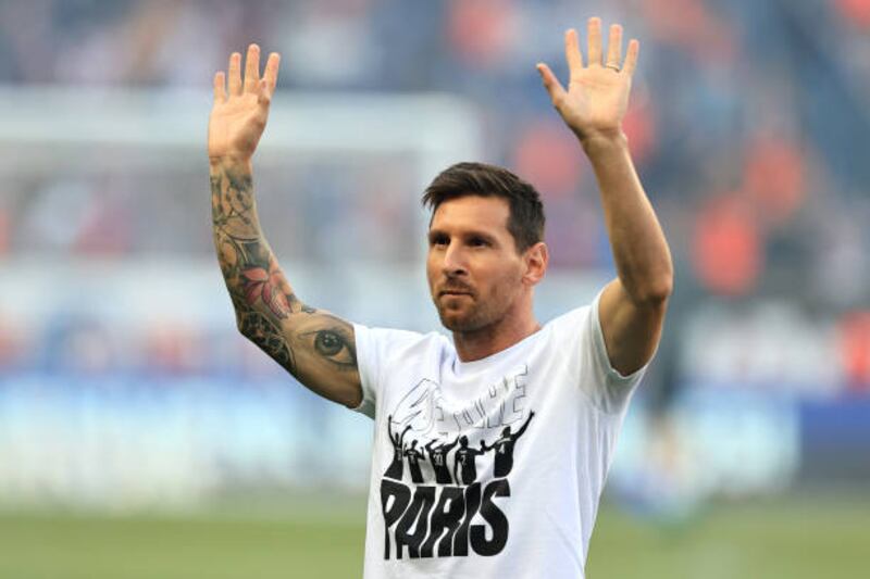 Lionel Messi of Paris Saint-Germain acknowledges the fans as he is introduced to the fans prior to the Ligue 1 Uber Eats match between Paris Saint Germain and Strasbourg at Parc des Princes in Paris, France.