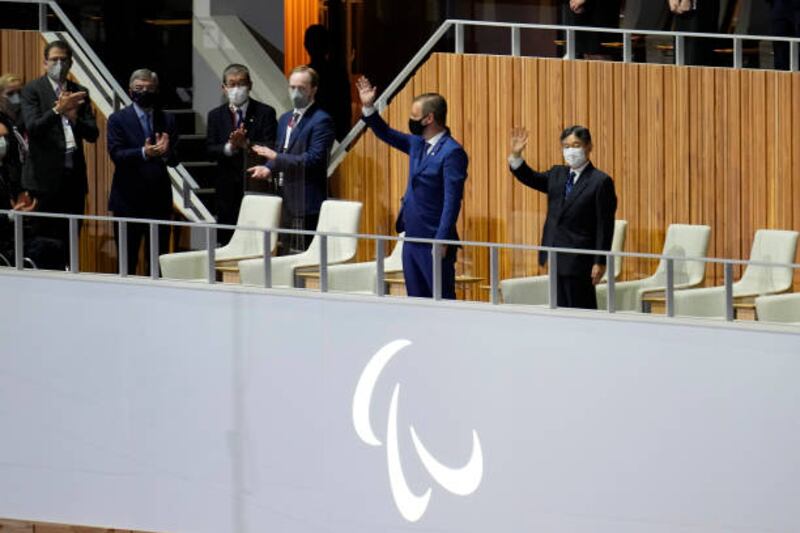 International Paralympic Committee president Andrew Parsons, centre, Japanese Emperor Naruhito, right, arrive for the opening ceremony of the Tokyo 2020 Paralympic Games. Getty