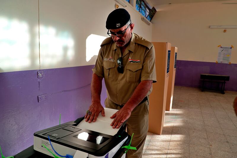 A soldier casts his vote in Baghdad. AP Photo