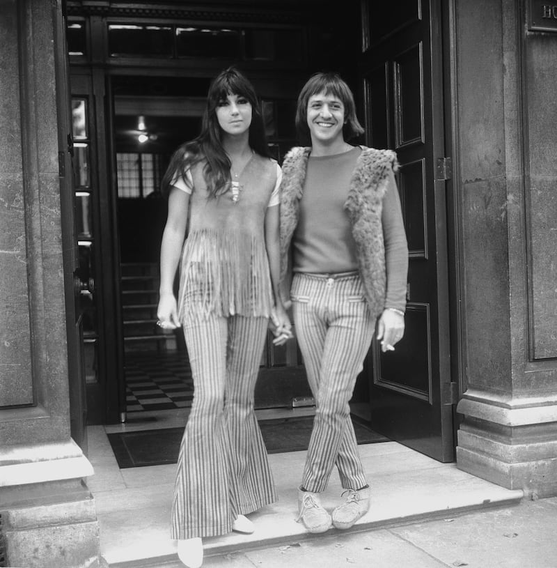 Sonny (Salvatore Bono, 1935 - 1998) and Cher (Cherilyn Sarkasian La Pier) on their trip to Britain just after getting married.   (Photo by S O'Meara/Getty Images)