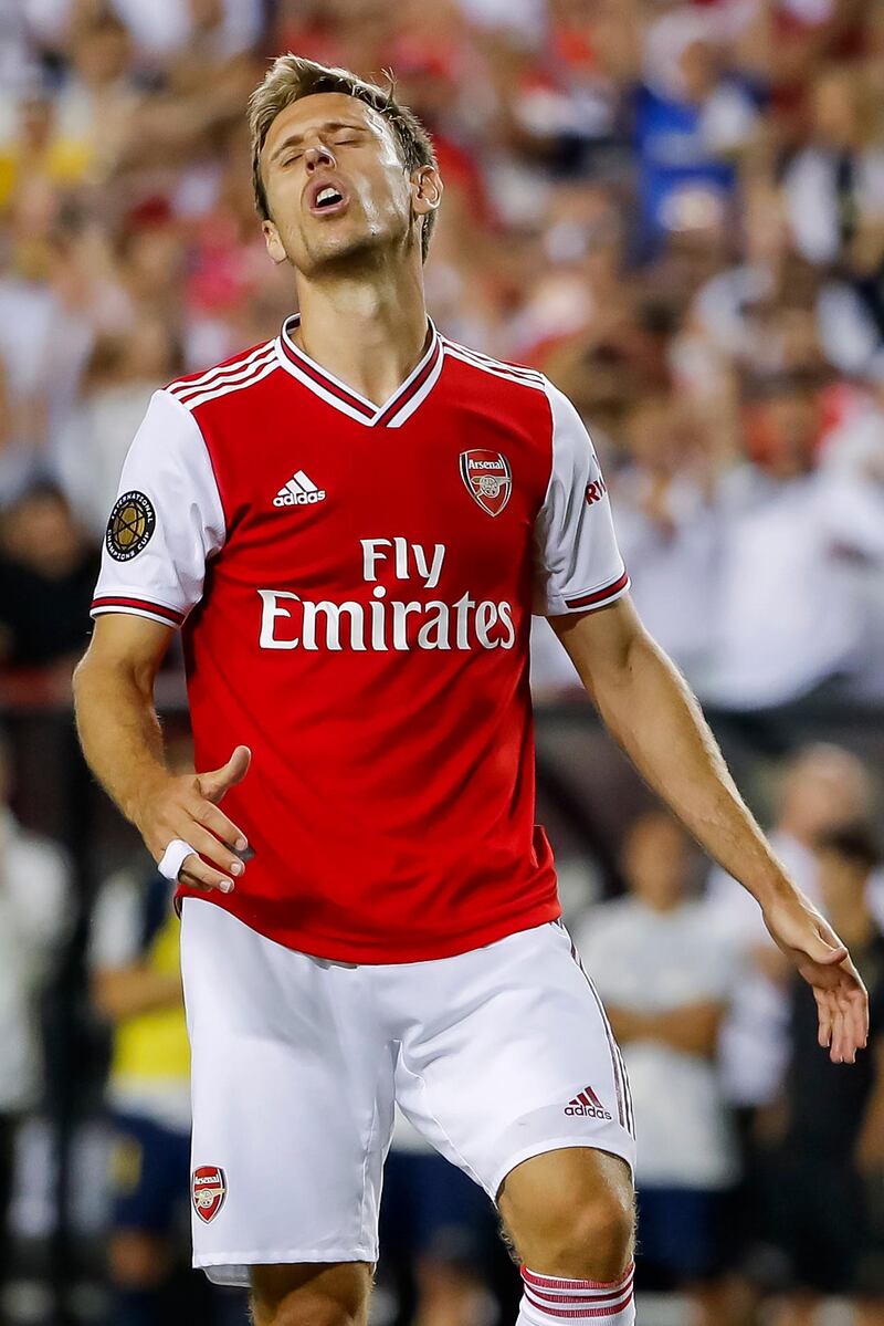 Arsenal defender Nacho Monreal reacts after missing a penalty kick. EPA