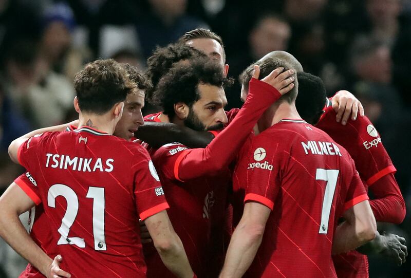 Liverpool's Mohamed Salah celebrates with teammates after scoring their second goal. Reuters