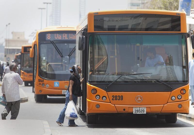 Passengers looking for a bus at Rolla bus station in Sharjah. Jaime Puebla / The National 