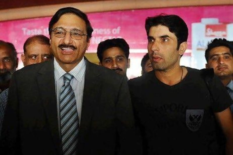 Zaka Ashraf, left, the Pakistan Cricket Board chairman, seen here with the captain Misbah-ul-Haq, needs to change the mindset of his players. Arif Ali / AFP
