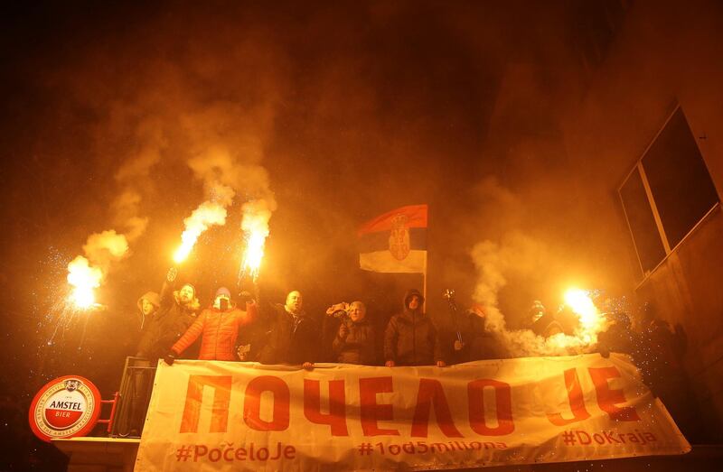 People demonstrate in front of the Radio Television of Serbia headquarters during an anti-government protest in Belgrade, Serbia, January 5, 2019. The banner reads "It has started". REUTERS/Marko Djurica