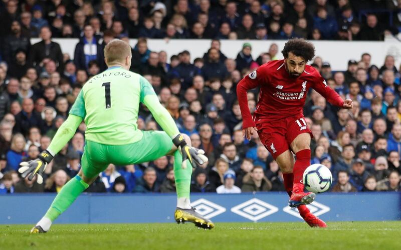 Soccer Football - Premier League - Everton v Liverpool - Goodison Park, Liverpool, Britain - March 3, 2019  Everton's Jordan Pickford saves a shot from Liverpool's Mohamed Salah       Action Images via Reuters/Carl Recine  EDITORIAL USE ONLY. No use with unauthorized audio, video, data, fixture lists, club/league logos or "live" services. Online in-match use limited to 75 images, no video emulation. No use in betting, games or single club/league/player publications.  Please contact your account representative for further details.