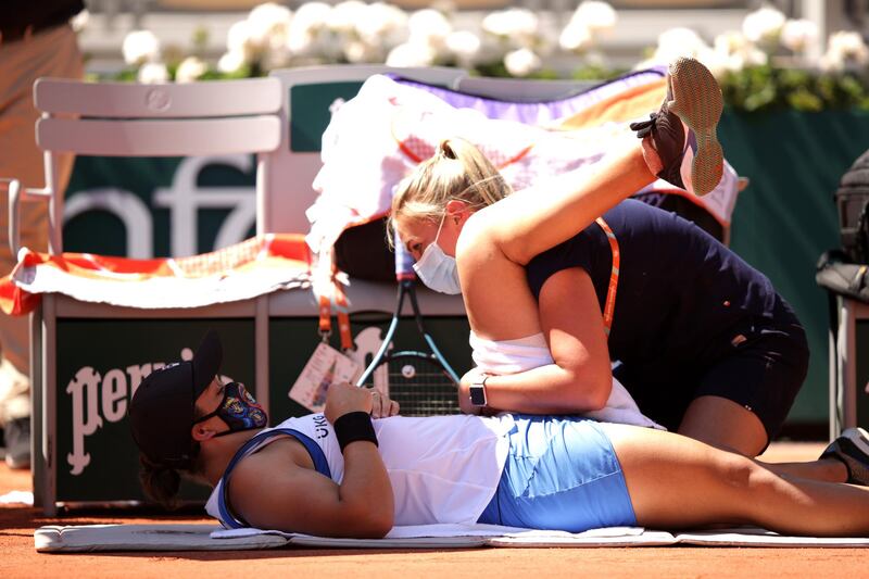 Australia's Ashleigh Barty receives medical treatment during her first-round match against Bernarda Pera of the United States. Getty