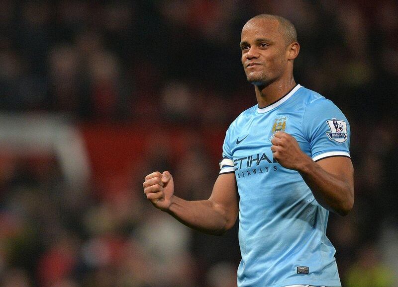 Manchester City captain Vincent Kompany reacts at the final whistle after their 3-0 victory over Manchester United on Tuesday. Paul Ellis / AFP / March 25, 2014