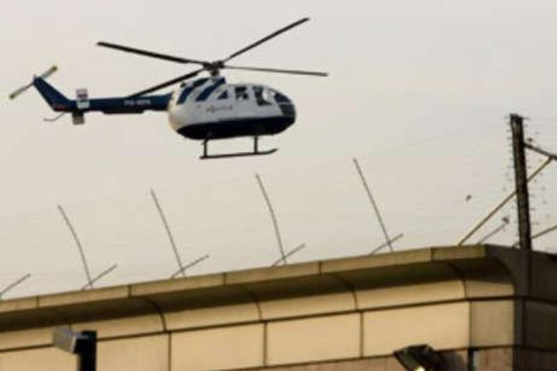 Radovan Karadzic arrives at the UN detention unit in The Hague on July 30.