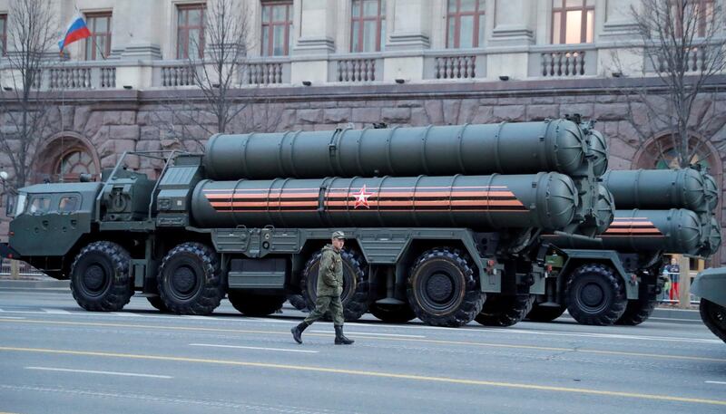 FILE PHOTO: A Russian serviceman walks past S-400 missile air defence systems before a rehearsal for a military parade in Moscow, Russia, April 29, 2019. REUTERS/Tatyana Makeyeva/File Photo