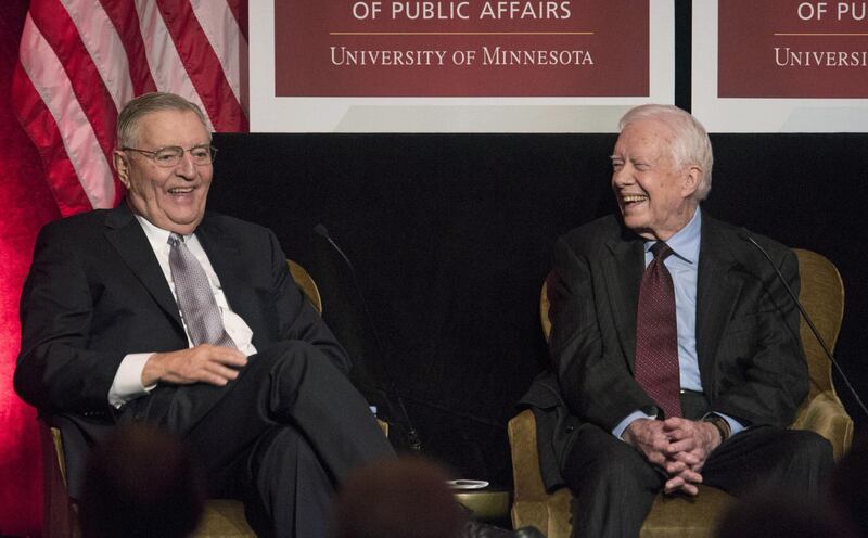 Former president Jimmy Carter, right, joins Mondale at an event hosted by the Humphrey School of Public Affairs at the University of Minnesota. Reuters