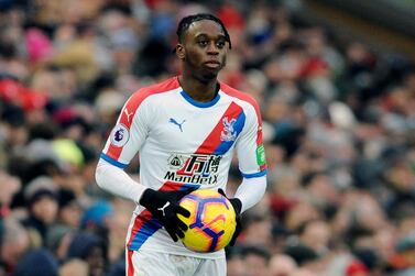 FILE - In this file photo dated Saturday, Jan. 19, 2019, Crystal Palace's Aaron Wan-Bissaka during the English Premier League soccer match against Liverpool at Anfield in Liverpool, England. Aaron Wan-Bissaka has signed a five-year contract with Manchester United, the Premier League club have announced Saturday June 29, 2019. (AP Photo/Rui Vieira, FILE)