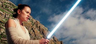 This image released by Lucasfilm shows Daisy Ridley as Rey in "Star Wars: The Last Jedi." The Skywalker saga may be coming to an end this December as the latest Star Wars trilogy finishes, but 8 months out from its release fans still know precious little about what director J.J. Abrams and Lucasfilm president Kathleen Kennedy have in store for â€œEpisode IX," which opens nationwide on Dec. 20.  (Lucasfilm via AP)