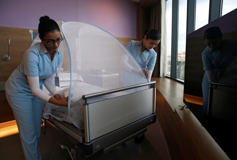 Nurses set up a mosquito tent, as part of a precautionary protocol for patients who are infected by Zika, at a hospital in Singapore on September 2, 2016. Edgar Su / Reuters