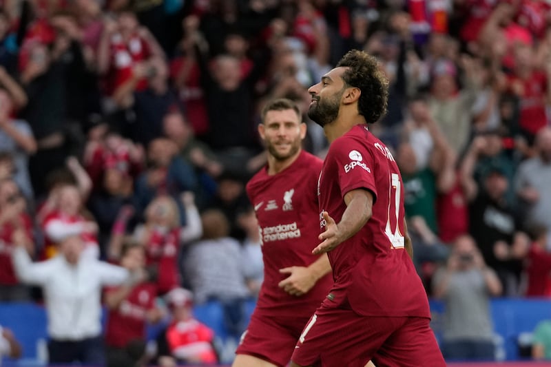 Mohamed Salah celebrates after scoring Liverpool's second goal. AP