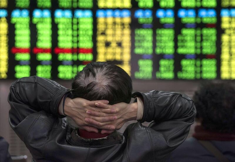 The Shanghai Composite hitting 5,000 is one of Saxo Bank's outrageous forecasts. Johannes Eisele / AFP