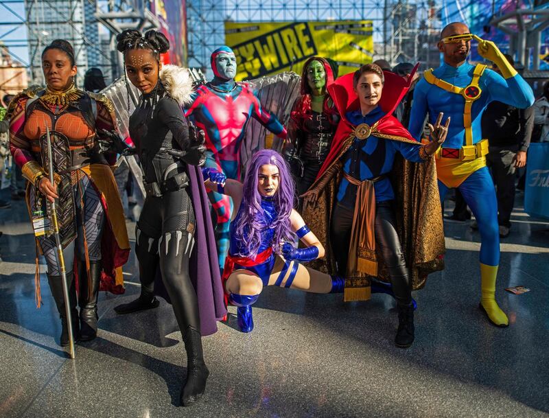 Costumed superheroes from Marvel pose during New York Comic Con.  AP