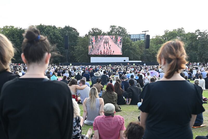 Mourners watch the procession at Hyde Park. Getty Images