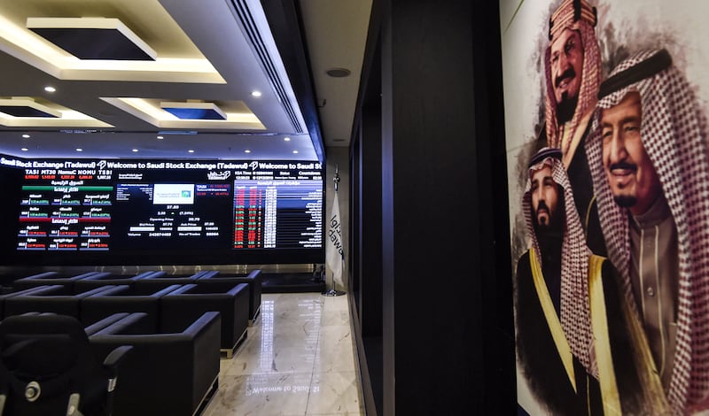 A view of the exchange board at the Stock Exchange Market (Tadawul) bourse in Riyadh displaying Aramco shares. AFP