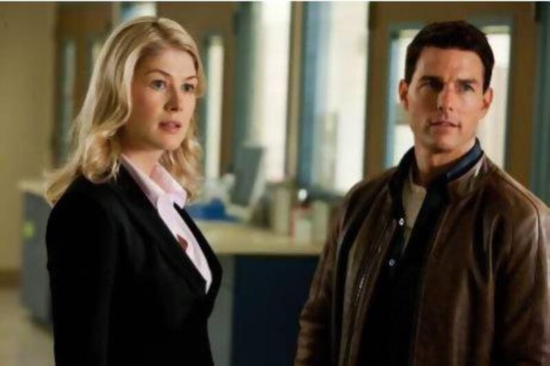 Rosamund Pike and Tom Cruise star in Jack Reacher, based on a Lee Child novel. Karen Ballard / AP Photo