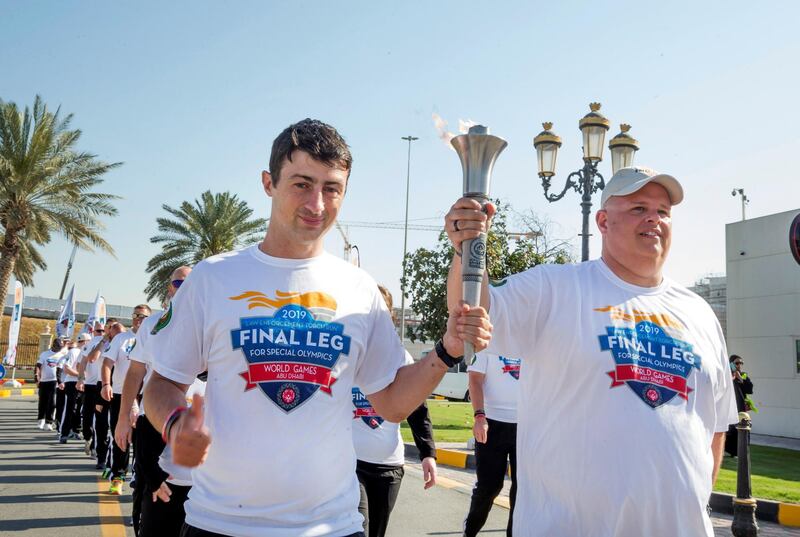 DUBAI, UNITED ARAB EMIRATES - Arrival of the torch at the Special Olympics Torch Run at Al Thiqah Club for Handicapped.  Leslie Pableo for The National
