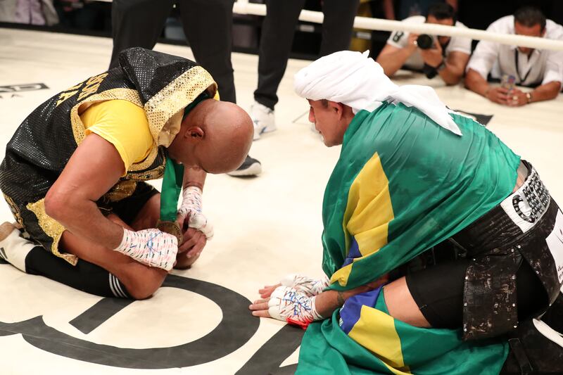 Anderson Silva and Bruno Machado (R) after their bout.