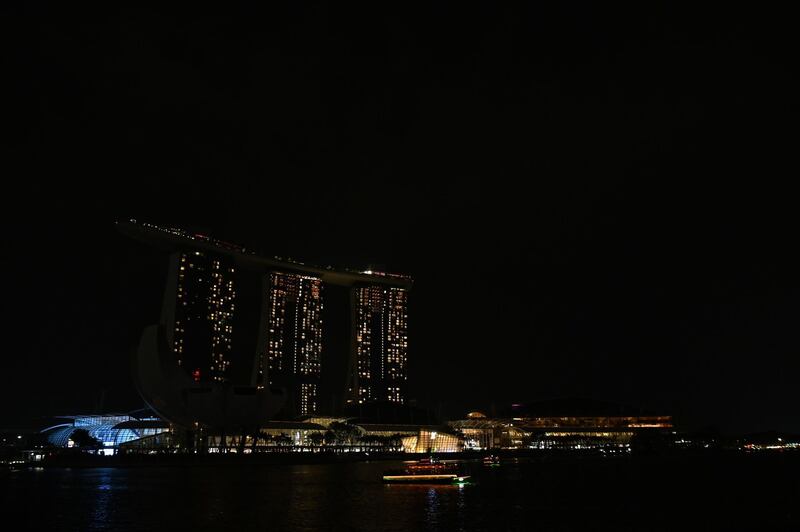 Singapore's Marina Bay Sands hotel and resort fights through the drakness during the Earth Hour. AFP
