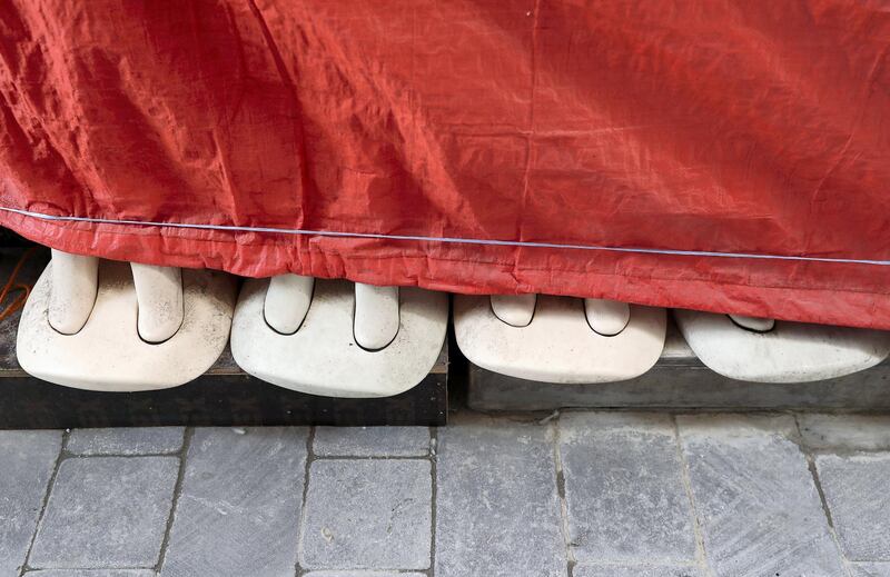 DUBAI, UNITED ARAB EMIRATES , March 24 – 2020 :- Mannequins covered at one of the closed garment shop in Deira as people are staying home as a preventive measure against coronavirus in Deira Dubai. (Pawan Singh / The National) For News/Online/Standalone.