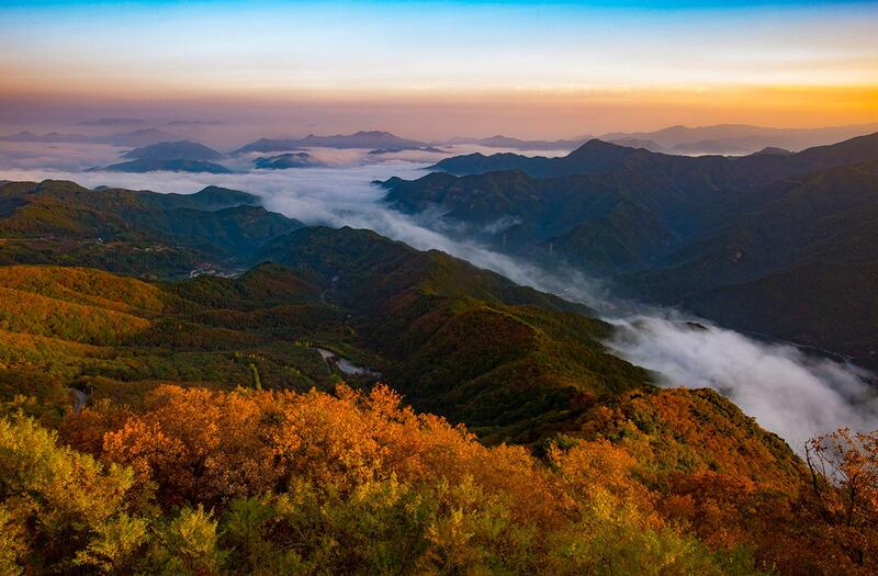 Autumn leaves are seen on Jeoksang Mountain in Muju, North Jeolla Province, South Korea, Yonhap / EPA