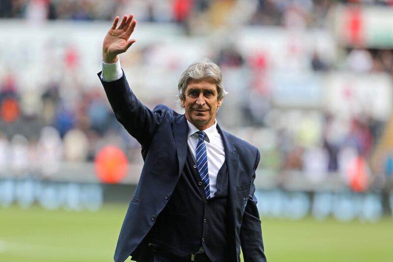Manchester City's Chilean manager Manuel Pellegrini waves to supporters after the English Premier League football match between Swansea City and Manchester City at The Liberty Stadium in Swansea, south Wales on May 15, 2016.
The game finished 1-1. / AFP PHOTO / GEOFF CADDICK / RESTRICTED TO EDITORIAL USE. No use with unauthorized audio, video, data, fixture lists, club/league logos or 'live' services. Online in-match use limited to 75 images, no video emulation. No use in betting, games or single club/league/player publications.  / 