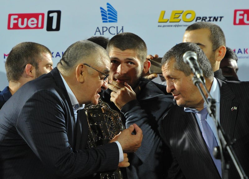 From left to right: Dagestan's acting Minister of Physical Culture and Sports, Magomed Magomedov, Khabib Nurmagomedov, and his father Abdulmanap Nurmagomedov. Reuters