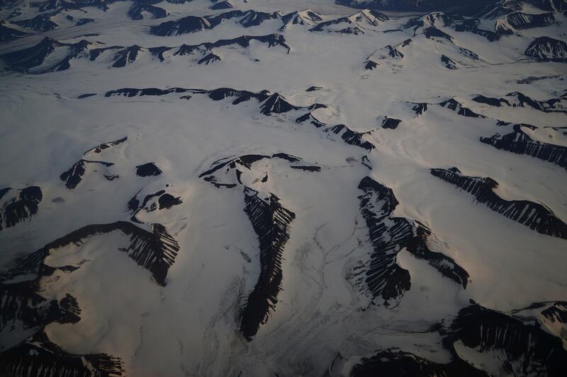 An aerial view shows snow-covered mountains in Svalbard. Reuters, file