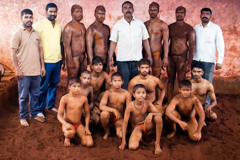 Wrestlers with their coach, Maruti Mane (in the centre), training at the Juna Hanuman taleem in Pargaon village of Maharashtra’s Kolhapur district. Sanket Jain for The National