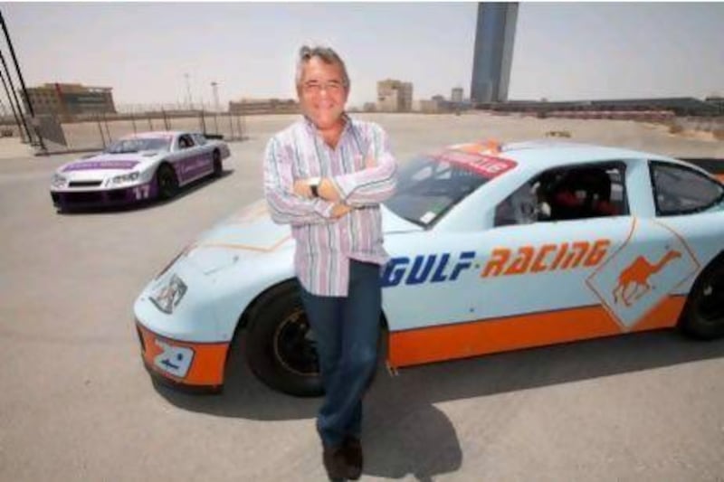 Gulf Racing's Fabien Giroix with one of the cars that will be used and kept at Dubai Autodrome.
