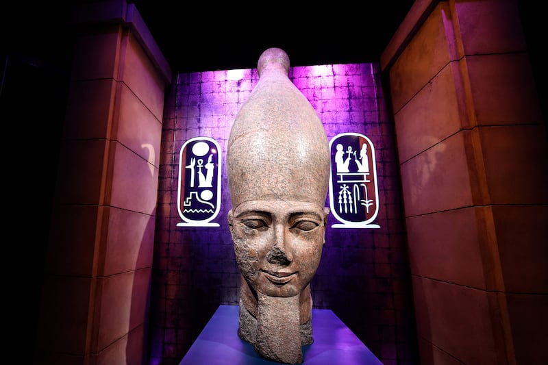 The head of a colossal statue of Ramses II. AFP