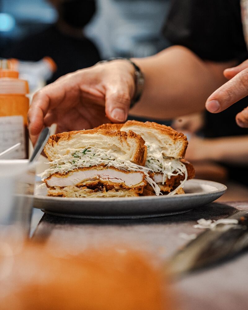 The chicken katsu sando + letsbrioche bread is on a specially curated menu as part of Reif Othman and Faisal Alharmoodi's collaboration in Abu Dhabi