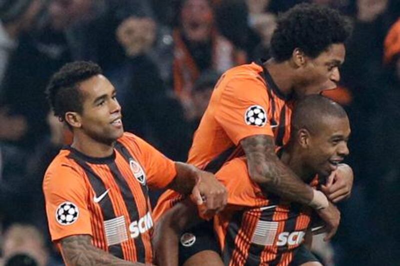 Shakhtar's Brazilian stars Alex Teixeira, Fernandinho and Luiz Adriano