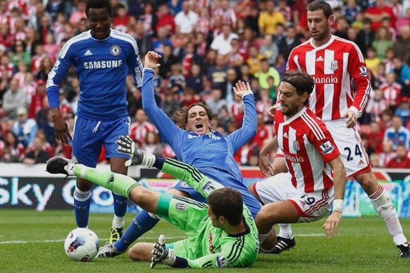 Fernando Torres, centre, is thwarted by Stoke goalkeeper Asmir Begovic but there were encouraging signs of a return to form by the Spanish centre-forward despite not scoring.

Jon Super / AP Photo