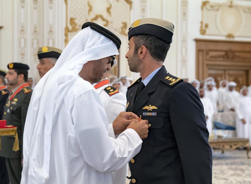 ABU DHABI, UNITED ARAB EMIRATES - April 08, 2019: HH Sheikh Mohamed bin Zayed Al Nahyan, Crown Prince of Abu Dhabi and Deputy Supreme Commander of the UAE Armed Forces (L), presents an Emirates Military Medal to HH Sheikh Mohamed bin Suroor Al Nahyan (R), during a Sea Palace barza.

( Mohamed Al Hammadi / Ministry of Presidential Affairs )
---