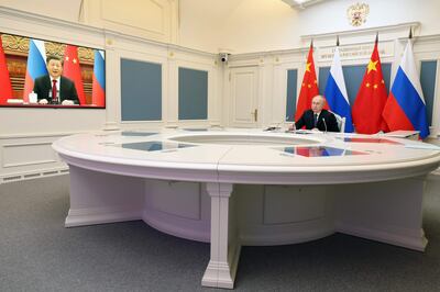 Russian President Vladimir Putin and Chinese President Xi Jinping hold an end-of-year video call. AFP