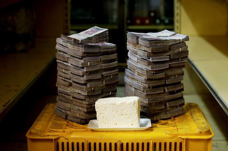 A kilogram of cheese is pictured next to 7,500,000 bolivars