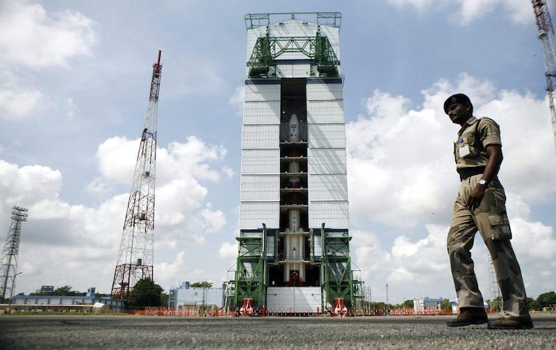 A paramilitary soldier walks past the Polar Satellite Launch Vehicle (PSLV-C25) at the Satish Dhawan Space Center at Sriharikota, in the southern Indian state of Andhra Pradesh in 2013. Photo: AP