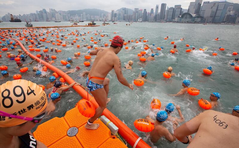 Competitors take part in the annual cross harbour swim in Tsim Sha Tsui, Kowloon, Hong Kong, China.  EPA